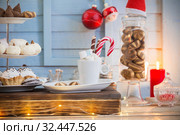 Christmas bar cacao decoration with cookies and sweets on blue wooden background in vintage style. Стоковое фото, фотограф Майя Крученкова / Фотобанк Лори