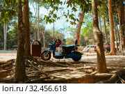 Motorbike, scooter, traditional two wheels transport in Asia. Стоковое фото, фотограф Aleksejs Bergmanis / Фотобанк Лори
