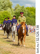 Russia, Samara, July 2019: Solemn departure of the jigitovka group at the festival. Редакционное фото, фотограф Акиньшин Владимир / Фотобанк Лори