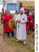 Russia, Samara, July 2019: an ethno-historical holiday with a reconstruction of the battle of Timur and Tokhtamysh in 1391. The participants of the festival. Khan surrounded by suites. Редакционное фото, фотограф Акиньшин Владимир / Фотобанк Лори