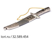 Souvenir knife shot in closeup in the studio (2019 год). Редакционное фото, фотограф Miru misiura / Фотобанк Лори