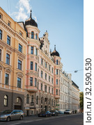 Riga Art Nouveau (Jugendstil), pink house with bay windows and turrets on Elizabetes street (Elizabetes iela), 6 (2014 год). Редакционное фото, фотограф Юлия Бабкина / Фотобанк Лори