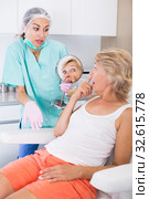 Unhappy woman in clinic of esthetic medicine. Стоковое фото, фотограф Яков Филимонов / Фотобанк Лори