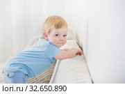 beautiful smile baby on white background. Стоковое фото, фотограф Майя Крученкова / Фотобанк Лори