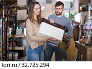 couple searching useful things for home interior. Стоковое фото, фотограф Яков Филимонов / Фотобанк Лори