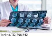 Doctor examining MRI image in hospital. Стоковое фото, фотограф Elnur / Фотобанк Лори