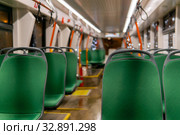 Partially blurred low-floor tram interior. Стоковое фото, фотограф Евгений Харитонов / Фотобанк Лори
