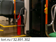 Interior elements of public transport on a blurred background. Стоковое фото, фотограф Евгений Харитонов / Фотобанк Лори