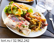 Blue ling fillet with stewed vegetables. French dish. Стоковое фото, фотограф Яков Филимонов / Фотобанк Лори