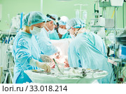 surgeons at work. female nurse at operation in child surgery hospital. Стоковое фото, фотограф Дмитрий Калиновский / Фотобанк Лори