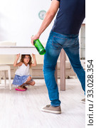 Drunk father in domestic child abuse and violence concept. Стоковое фото, фотограф Elnur / Фотобанк Лори
