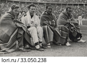 Олимпиада в Германии. 1936. Спортсмены из США и Швейцарии. Стоковое фото, фотограф WWII / Фотобанк Лори