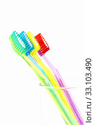 Colorful toothbrush in glass. Стоковое фото, фотограф Gábor Páll / PantherMedia / Фотобанк Лори