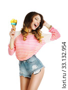 Pleasure. Cute Young Woman with Ice Cream Enjoying Life. Стоковое фото, фотограф Iryna Hramavataya / PantherMedia / Фотобанк Лори