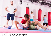 Kids practicing in pair self-protection. Стоковое фото, фотограф Яков Филимонов / Фотобанк Лори