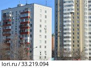 Двенадцатиэтажный блочный жилой дом II-18-31/12А. Улица Яблочкова, 21. Двадцатипятиэтажный монолитный жилой дом (жилой комплекс «Воронцовский посад»). Улица Яблочкова, 16. Бутырский район. Город Москва (2015 год). Редакционное фото, фотограф lana1501 / Фотобанк Лори