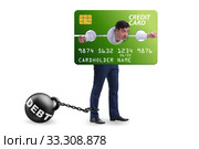 Businessman in credit card burden concept in pillory. Стоковое фото, фотограф Elnur / Фотобанк Лори