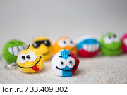 knitted emoticons , background. Стоковое фото, фотограф Типляшина Евгения / Фотобанк Лори