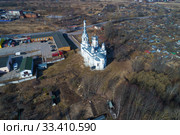 Вид на церковь святой  мученицы царицы Александры солнечным мартовским днем (аэросъемка). Деревня Низино. Ленинградская область, Россия (2020 год). Стоковое фото, фотограф Виктор Карасев / Фотобанк Лори