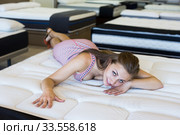 customer testing mattresses. Стоковое фото, фотограф Яков Филимонов / Фотобанк Лори