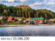 Artybash village, Lake Teletskoye, Turochaksky district, Altai Republic, Russia - September, 20, 2019: Village on the shore of a mountain lake. Стоковое фото, фотограф Вадим Орлов / Фотобанк Лори