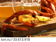 Crayfish with beer on a wooden table. Стоковое фото, фотограф Марина Володько / Фотобанк Лори