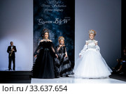 Москва, Гостиный двор, Россия - 21 марта 2019: Показ коллекцииIRINA SCHARLAU (дизайнер: Ирина Шарлау) Осень-Зима 2019-2020 в рамках Московской Недели Моды. Детская мода. Редакционное фото, фотограф Мария Москвицова / Фотобанк Лори