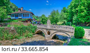 Stone bridge in the Etar village, Bulgaria (2019 год). Редакционное фото, фотограф Sergii Zarev / Фотобанк Лори