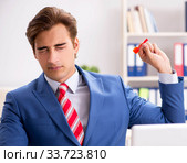 Businessman throwing dart in business concept. Стоковое фото, фотограф Elnur / Фотобанк Лори