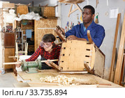 Restorers working with wooden furniture. Стоковое фото, фотограф Яков Филимонов / Фотобанк Лори