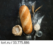 Sourdough Bloomer or Baton loaf bread. Стоковое фото, фотограф Ольга Сергеева / Фотобанк Лори
