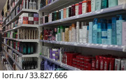 Assortment of haircare products and wigs at cosmetics store (2020 год). Редакционное видео, видеограф Яков Филимонов / Фотобанк Лори