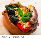 Kapama a dish of bulgarian cuisine with assortiment meat, grape rolls. Стоковое фото, фотограф Яков Филимонов / Фотобанк Лори