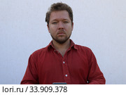 Портрет мужчины с бородой с разными эмоциями на лице. Стоковое фото, фотограф Кузнецов Максим / Фотобанк Лори