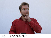Портрет мужчины с бородой с разными эмоциями на лице. Стоковое фото, фотограф Кузнецов Максим / Фотобанк Лори