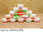 Handmade candles in the shape of a cylinder. Стоковое фото, фотограф Nataliia Zhekova / Фотобанк Лори