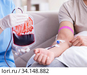 Patient getting blood transfusion in hospital clinic. Стоковое фото, фотограф Elnur / Фотобанк Лори