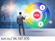 HSE concept for health safety environment with businessman. Стоковое фото, фотограф Elnur / Фотобанк Лори