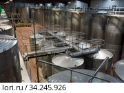 Shop with processing cisterns in wine plant. Стоковое фото, фотограф Яков Филимонов / Фотобанк Лори