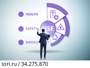 HSE concept for health safety environment with businessman. Стоковое фото, фотограф Elnur / Фотобанк Лори