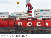 Time lapse: container terminal commercial sea port, unloaded container ship Sevmorput - Russian nuclear-powered icebreaker lighter aboard ship carrier (2019 год). Редакционное фото, фотограф А. А. Пирагис / Фотобанк Лори