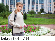 Smiling and happy schoolgirl in grade 6, Caucasian girl with school bag, copy space, portrait outdoor. Стоковое фото, фотограф Кекяляйнен Андрей / Фотобанк Лори