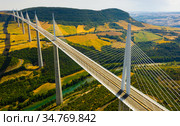 Cable-stayed Millau Viaduct spanning Tarn River valley, France. Стоковое фото, фотограф Яков Филимонов / Фотобанк Лори