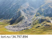 Stone scree - the consequences of a landslide in the mountains. Стоковое фото, фотограф Евгений Харитонов / Фотобанк Лори