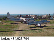 Самолеты Ан-24 и МиГ-21. Музей «Военная горка», Темрюк (2020 год). Редакционное фото, фотограф Мария Кылосова / Фотобанк Лори
