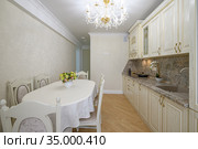 Luxury modern neoclassic beige kitchen interior. Стоковое фото, фотограф Сергей Старуш / Фотобанк Лори