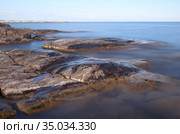 Верхушки скальных образований, выступающие из воды. Стоковое фото, фотограф EgleKa / Фотобанк Лори
