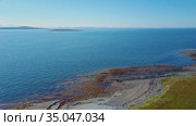 Aerial view of the landscape of the Rybachy Peninsula, Russia. Military pillbox on the shore of the Barents sea. Стоковое видео, видеограф Aleksandr Lutcenko / Фотобанк Лори