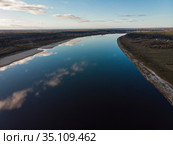 Two banks of a large river. Reflection of the sky in the water / Два берега большой реки. Отражение неба в воде. Стоковое фото, фотограф Яковлев Сергей / Фотобанк Лори