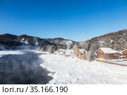 View of the winter Altai with the Biya river, Artybash village and mountains on the horizon. Altai Republic, Russia (2020 год). Стоковое фото, фотограф Наталья Волкова / Фотобанк Лори